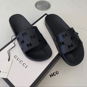 Gucci slides (all black)